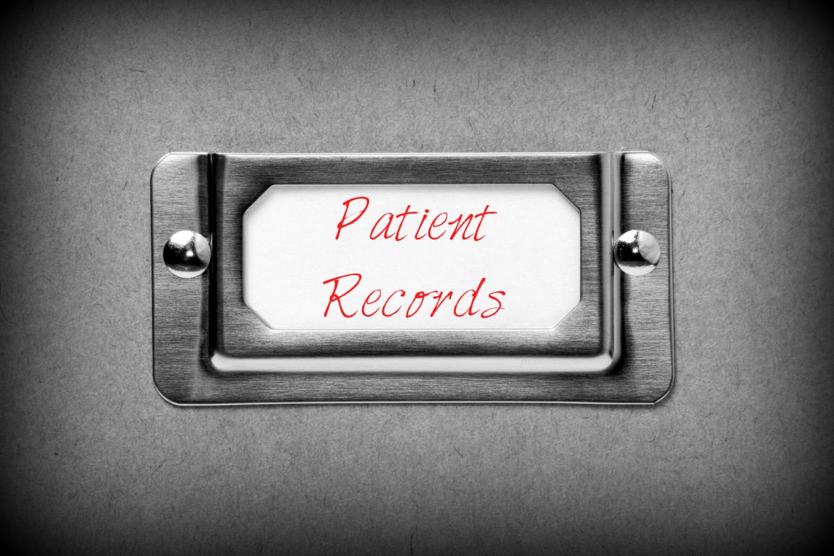 Filing Cabinet close-up with the words "Patient Records" in red on the label